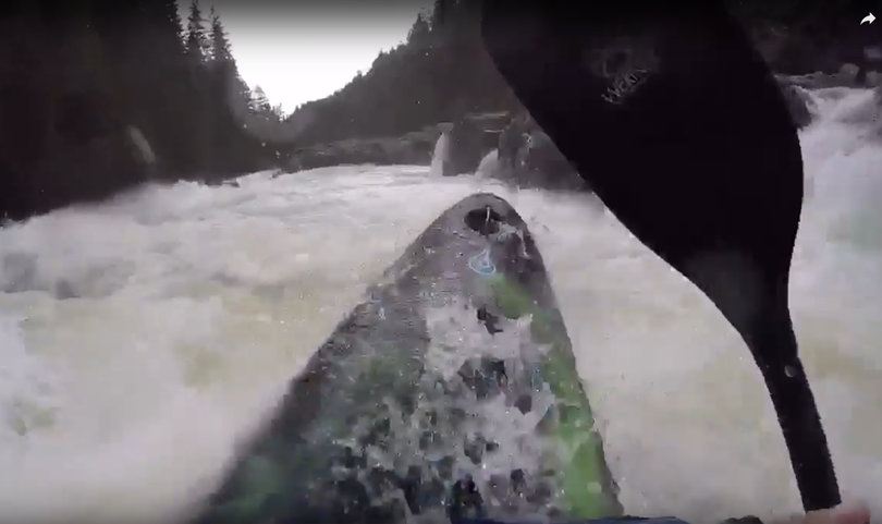 Kayakers paddle whitewater with the Yaak River at 4.9 feet. (Brian Jamieson)