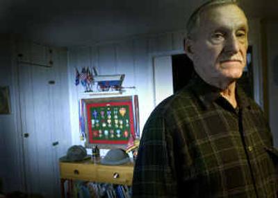 
Ray Garland of Coeur d'Alene survived the Pearl Harbor attack aboard a ship moored next to the USS Arizona. Several years later, he survived the battle of the Chosin Reservoir in Korea. 
 (Jesse Tinsley / The Spokesman-Review)
