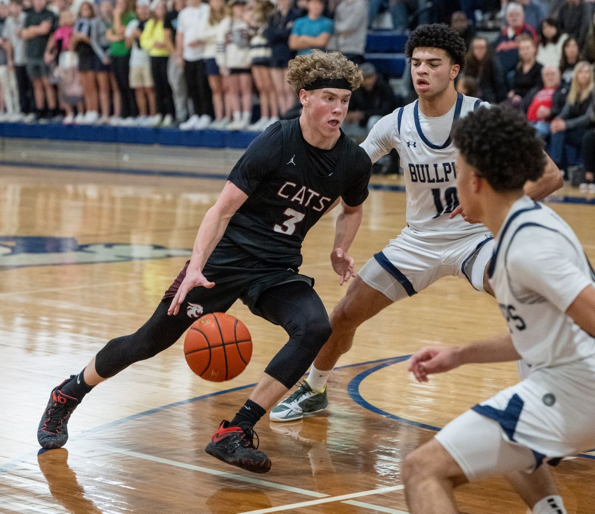 Mt. Spokane Ryan Lafferty (3) drives the ball into the key during a GSL high school basketball game with Gonzaga Prep, Friday, Jan. 13, 2023, at Gonzaga Prep.  (Colin Mulvany/The Spokesman-Review)