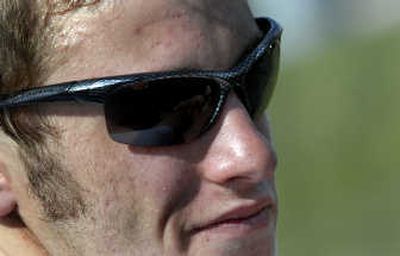 Lake City's John Coyle wears his tell-tale sunglasses during track practice at the school in Coeur d'Alene.
(Kathy Plonka / The Spokesman-Review)