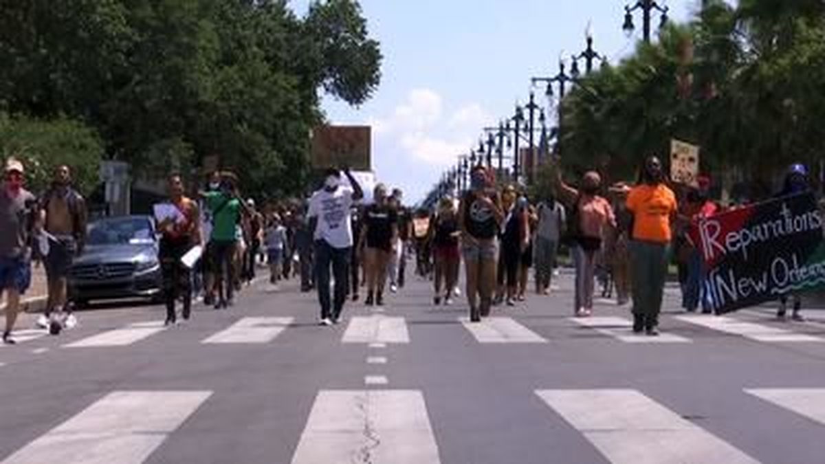 Dozens of demonstrators marched to the gates of Armstrong Park in New Orleans in honor of Juneteenth, the traditional commemoration date of the emancipation of enslaved African Americans in the U.S. 