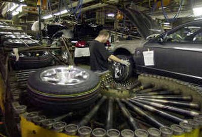 
Valdez Adams installs the tires on a Ford Mustang at the Dearborn Assembly Plant in Dearborn, Mich., this week. The Labor Department reported Thursday that productivity — the amount an employee produces for every hour on the job — rose at a 3.5 percent annual rate in the January-to-March quarter, up from a 2.5 percent pace registered in the previous quarter. Valdez Adams installs the tires on a Ford Mustang at the Dearborn Assembly Plant in Dearborn, Mich., this week. The Labor Department reported Thursday that productivity — the amount an employee produces for every hour on the job — rose at a 3.5 percent annual rate in the January-to-March quarter, up from a 2.5 percent pace registered in the previous quarter. 
 (File/Associated PressFile/Associated Press / The Spokesman-Review)