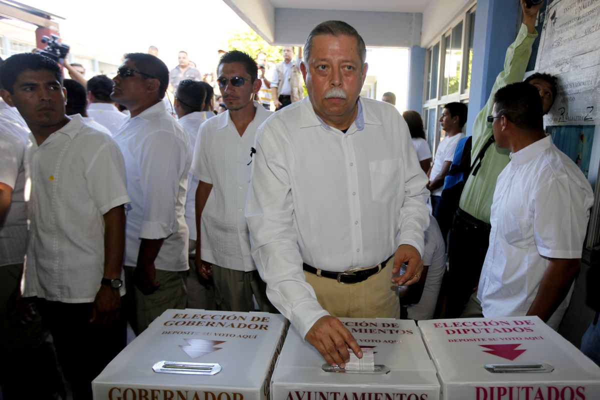 Candidate for governor of  Tamaulipas Egidio Torre, who replaced his brother who was gunned down last week, casts his vote  in Ciudad Victoria, Mexico, on Sunday.  (Associated Press)