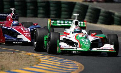 
Tony Kanaan stayed in front of Buddy Rice to win the Argent Mortgage Grand Prix.  
 (Associated Press / The Spokesman-Review)
