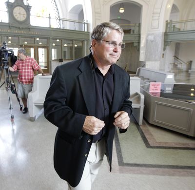 Scott Mason, president of the ILWU Tacoma Local 23, leaves the federal courthouse in Tacoma on Thursday. (Associated Press)