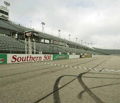 
The track and grandstands are empty at Darlington Raceway. NASCAR officials shuttled Darlington's signature Labor Day weekend race to the West Coast.
 (Associated Press / The Spokesman-Review)