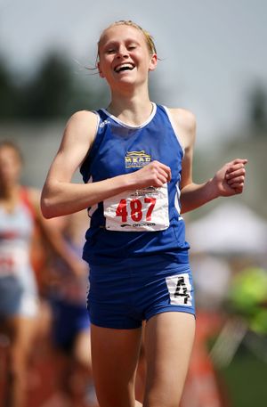 Mead’s Baylee Mires was all smiles as she won the 4A 800 meters, one of three first-place finishes. Special to  (Patrick Hagerty photos Special to / The Spokesman-Review)