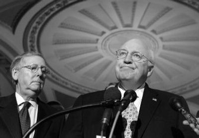 
Vice President Cheney speaks Tuesday on Capitol Hill about the war in Iraq, as Senate Minority Leader Mitch McConnell, R-Ky., stands at left.
 (Photos by Associated Press / The Spokesman-Review)
