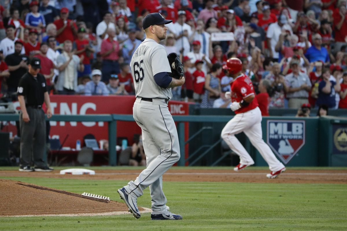 James Paxton forced out with injury as Mariners routed by Angels 11-2