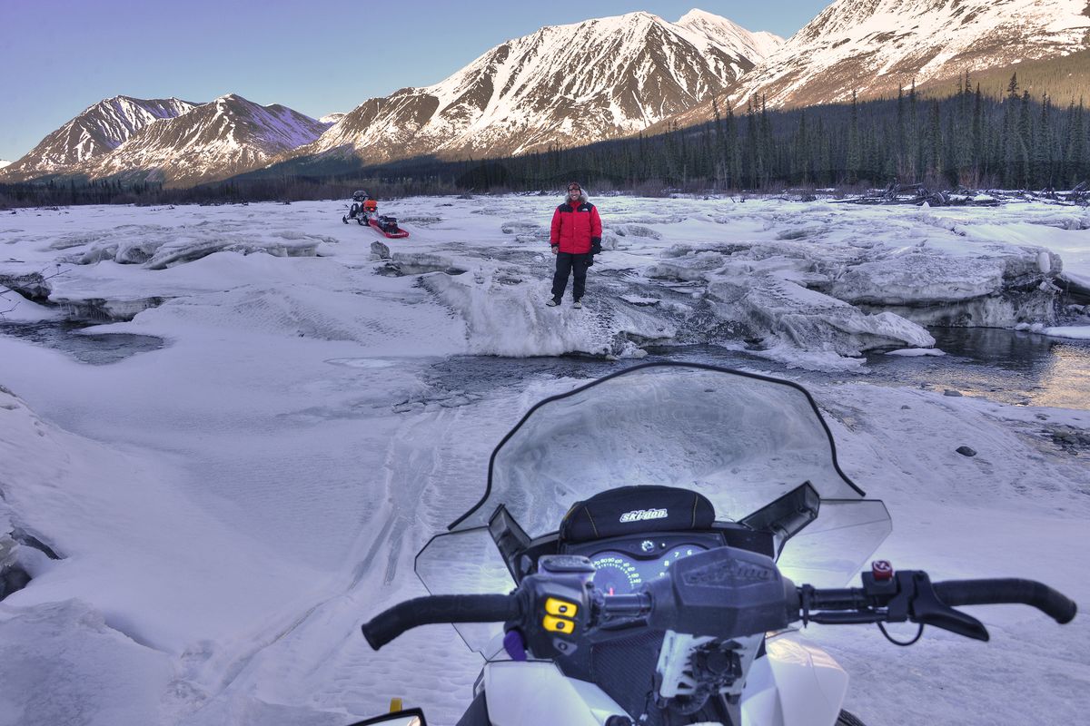 Sledders must cross ice bridges and open water slots in this treacherous stretch along the Iditarod Trail.