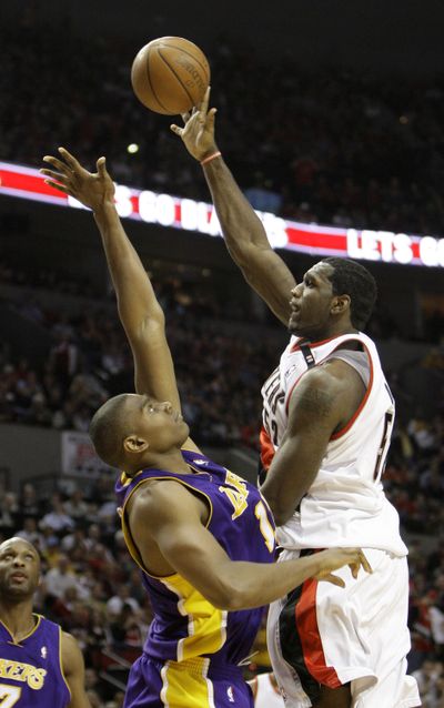 Greg Oden’s play has improved over the past 10 games. (Associated Press / The Spokesman-Review)