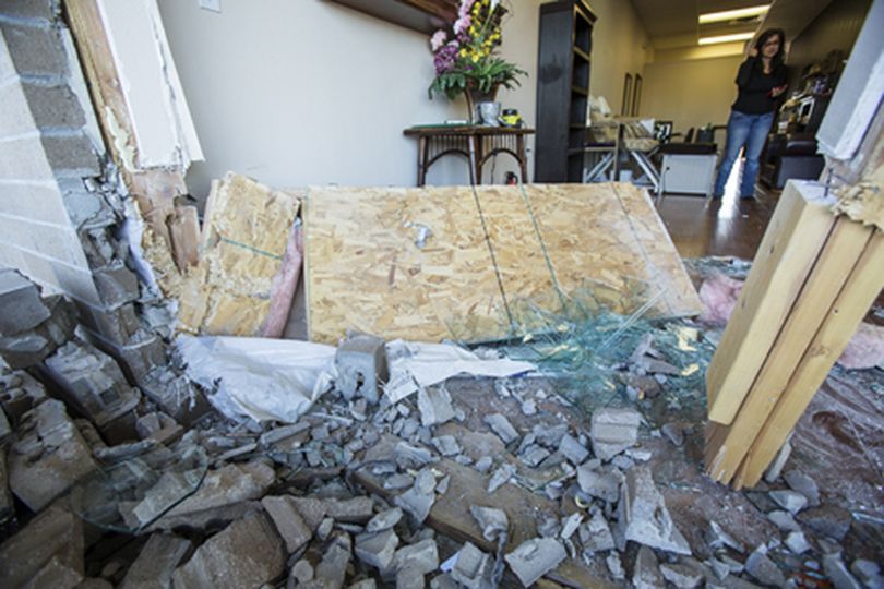 A pile of rubble is all that remains of the front of Wink Salon on Hess Street in Hayden after a driver lost control of their vehicle and ran into the front of the building Wednesday afternoon while pulling in to a parking space for the neighboring business. The Salon will remain open while the entry way is repaired. (Gabe Green/press)