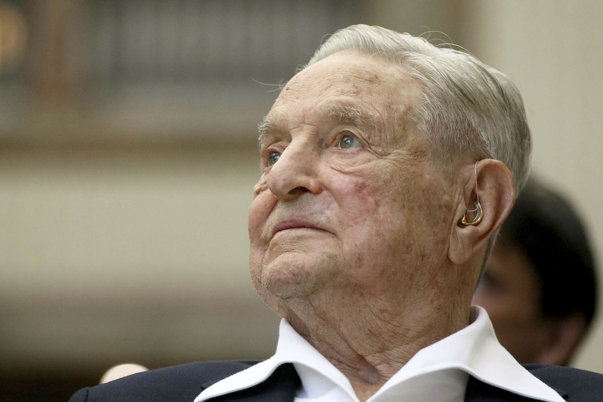 FILE - In this June 21, 2019, file photo, George Soros, Founder and Chairman of the Open Society Foundations, looks before the Joseph A. Schumpeter award ceremony in Vienna, Austria. Soros, the billionaire investor and philanthropist who has long been a target of conspiracy theories, is now being falsely accused of orchestrating and funding the protests over police killings of black people that have roiled the United States.  (Ronald Zak)