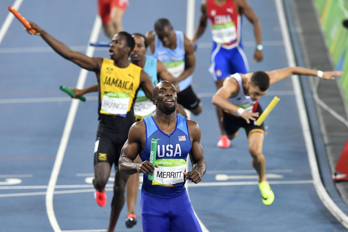 United States anchor Lashawn Merritt crosses the line to win the men’s 4x400-meter relay final on Saturday. (Martin Meissner / Associated Press)