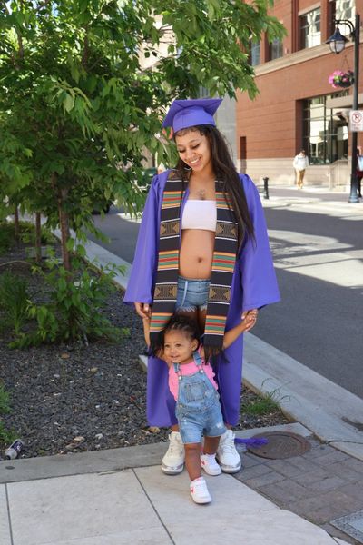 Keelah Lockhart, with her daughter and pregnant with her second child, just graduated from Lumen High School.  (Courtesy )