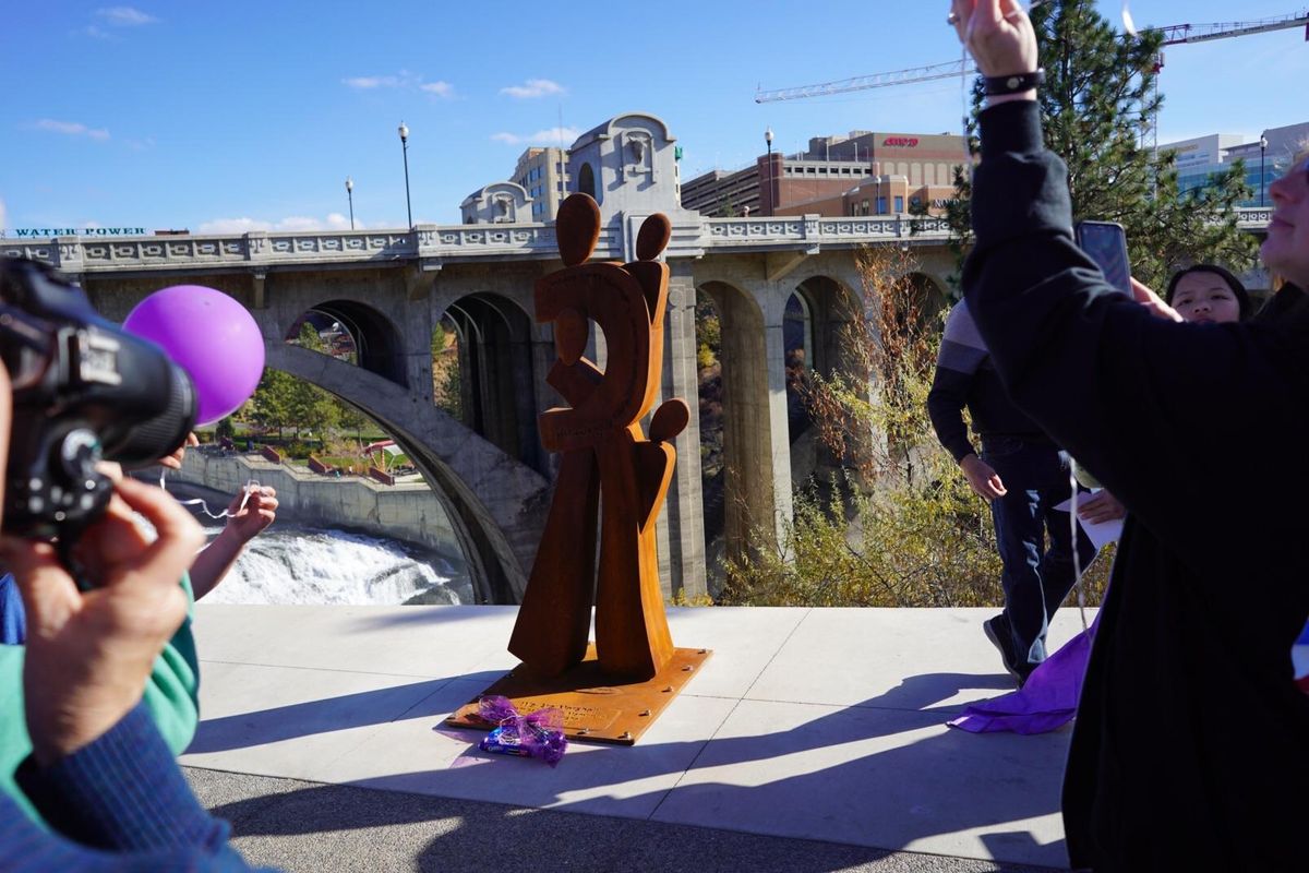 A new sculpture on the Centennial Trail honors the family of John Marshall, the former chief surgeon at Mann-Grandstaff VA Medical Center who was found dead in early 2016. (Will Campbell / The Spokesman-Review)