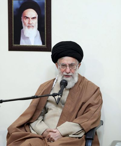 In this picture released by official website of the office of the Iranian supreme leader, Supreme Leader Ayatollah Ali Khamenei speaks in a meeting as he sits under a portrait of the late Iranian revolutionary founder Ayatollah Khomeini, in Tehran, Iran, Tuesday, Jan. 2, 2018. (Associated Press)