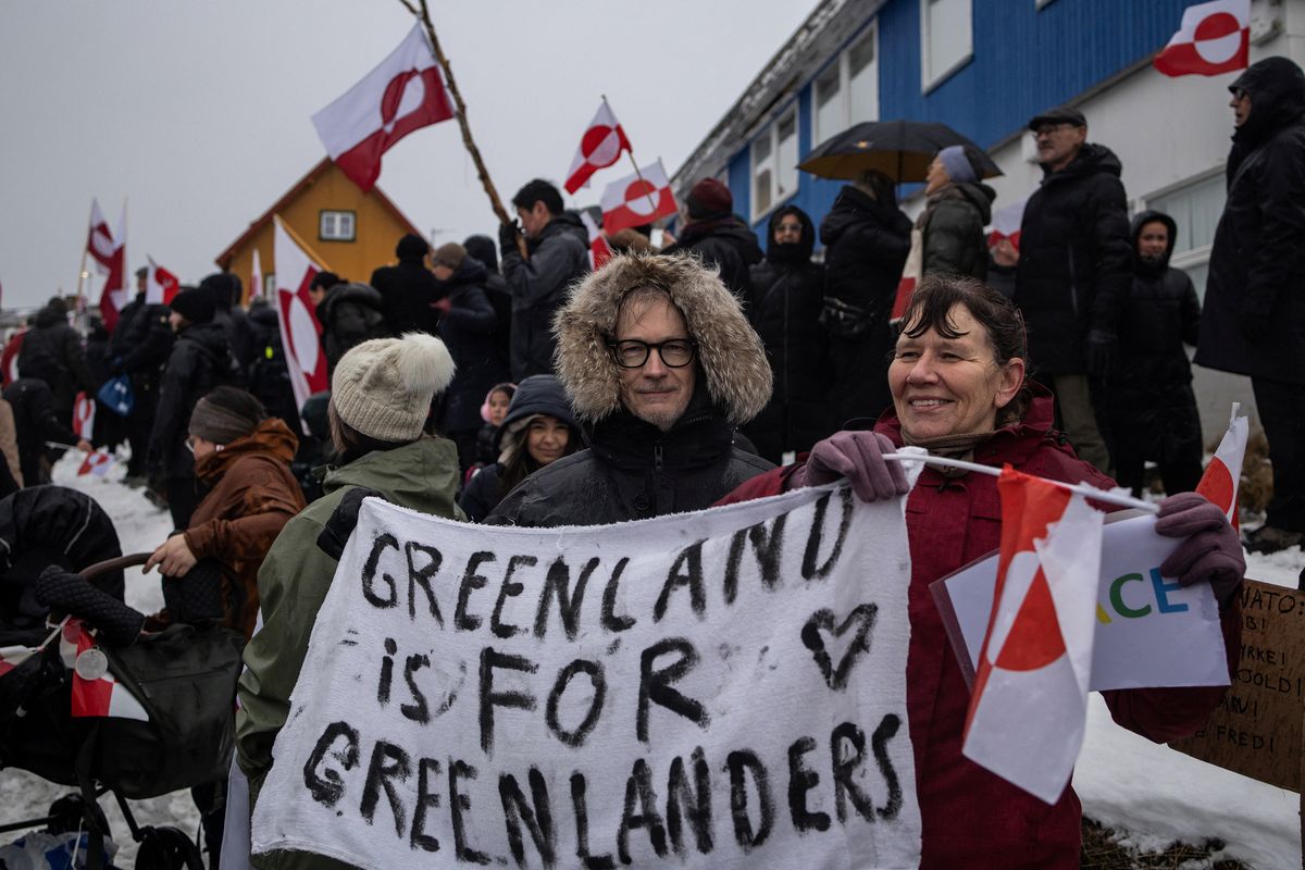 People attend a protest Saturday against U.S. President Donald Trump’s demand that the Arctic island be ceded to the U.S., calling for it to be allowed to determine its own future, in front of the U.S. consulate in Nuuk, Greenland.  (Reuters)