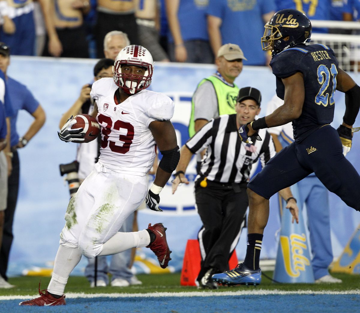 Stanford running back Stepfan Taylor, left, scoring against UCLA, is closing in on the school rushing record. (Associated Press)