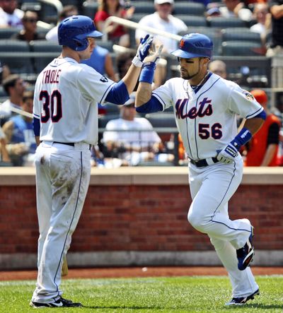 Andres Torres homered and went 3 for 3 in Mets’ victory. (Associated Press)