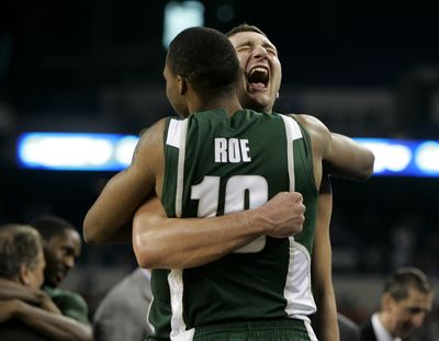 Michigan State’s Goran Suton hugs Delvon Roe near the end of the Spartans’ win over Louisville. (Associated Press / The Spokesman-Review)