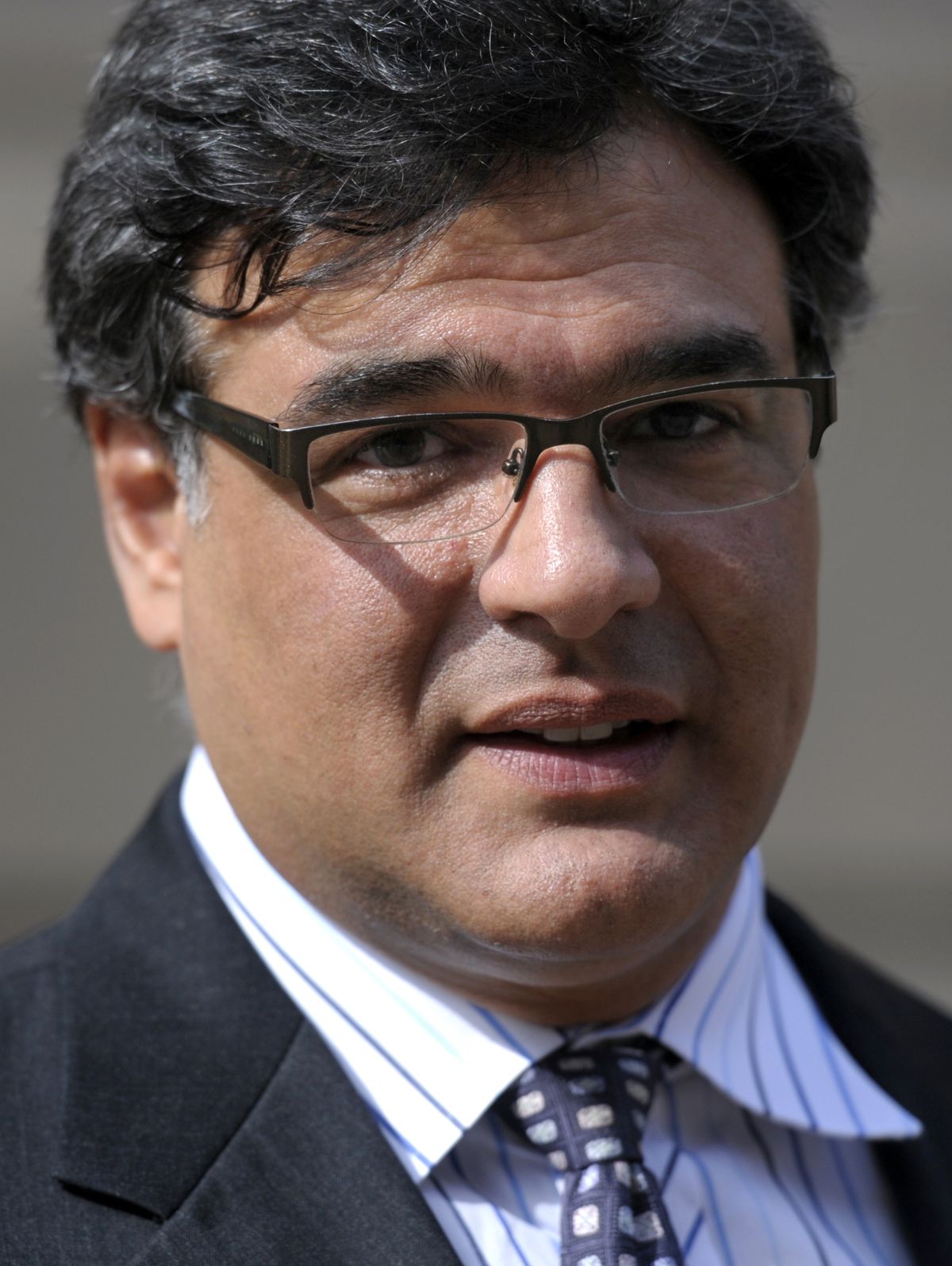 Former CIA officer John Kiriakou leaves U.S. District Courthouse in Alexandria, Va., Tuesday, Oct. 23, 2012, after pleading guilty, in a plea deal, to leaking the names of covert operatives to journalists. (Cliff Owen / Fr170079 Ap)