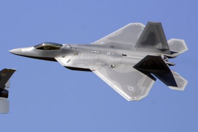 The radar-evading F-22 is designed to be the Air Force’s new air superiority fighter.  (Associated Press / The Spokesman-Review)