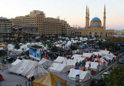 
Hezbollah supporters have pitched hundreds of white tents in downtown Beirut in an effort to pressure Western-backed Prime Minister Fuad Saniora into resigning.. 
 (Associated Press / The Spokesman-Review)