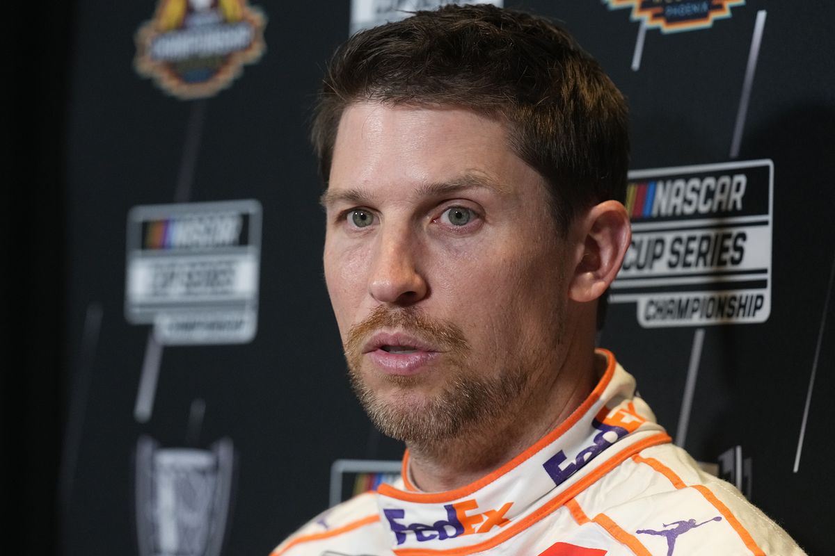 Denny Hamlin speaks on media day Thursday ahead of Sunday’s NASCAR Cup Series championship auto race in Phoenix.  (Rick Scuteri)