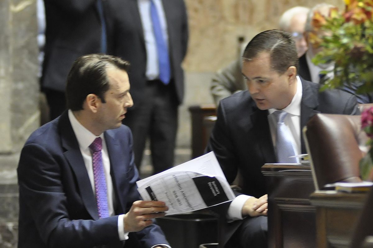 OLYMPIA – State Sen. Andy Billig, D-Spokane, left, confers with Sen. John Braun, R-Centralia, during debate over the operating budget during the 2018 session (Jim Camden / The Spokesman-Review)