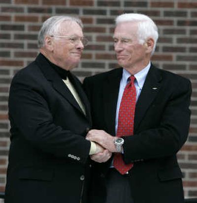
Neil Armstrong, left, is congratulated by fellow ex-astronaut Gene Cernan at Purdue after a dedication ceremony Saturday. Associated Press
 (Associated Press / The Spokesman-Review)