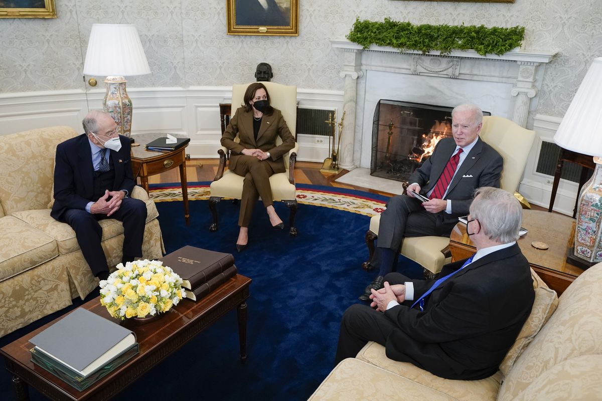 President Joe Biden and Vice President Kamala Harris meet with Sen. Dick Durbin, D-Ill., right, chairman of the Senate Judiciary Committee, and Sen. Chuck Grassley, R-Iowa, left, the ranking member, to discuss the upcoming Supreme Court vacancy in the Oval Office of the White House, Tuesday, Feb. 1, 2022, in Washington.  (Patrick Semansky)