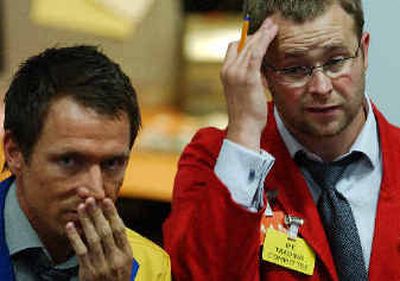Traders work in the pit at the International Petroleum Exchange in London Wednesday. Traders work in the pit at the International Petroleum Exchange in London Wednesday.
(Associated PressAssociated Press / The Spokesman-Review)