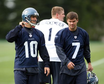 Kickers Olindo Mare, left, and  Brandon Coutu battle in Seattle.  (Associated Press / The Spokesman-Review)