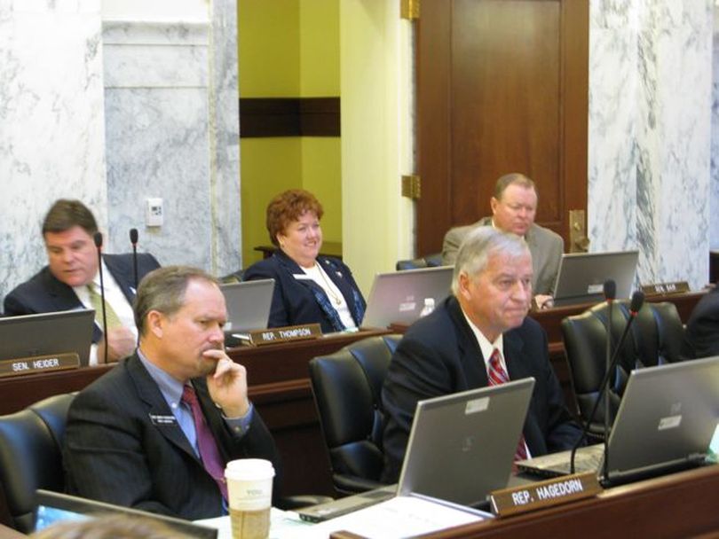 Sen. Joyce Broadsword, back row center, spoke in JFAC on Monday morning against a move to block the state Liquor Division from opening more stores until 9 p.m. on temperance grounds; Rep. John Vander Woude, R-Nampa, front row right, spoke in favor of the move, which failed; the committee then put off setting the Liquor Division budget until Tuesday. (Betsy Russell)