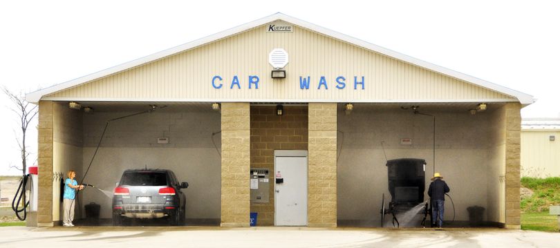 People use the car wash in Chesley, Ontario, Thursday, April 8, 2010. (Willy Waterton / The Canadian Press, Owen Sound S)