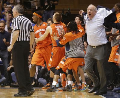 Syracuse coach Jim Boeheim reacts to an official’s charging call in the waning moments of a tightly contested game with Duke. (Associated Press)
