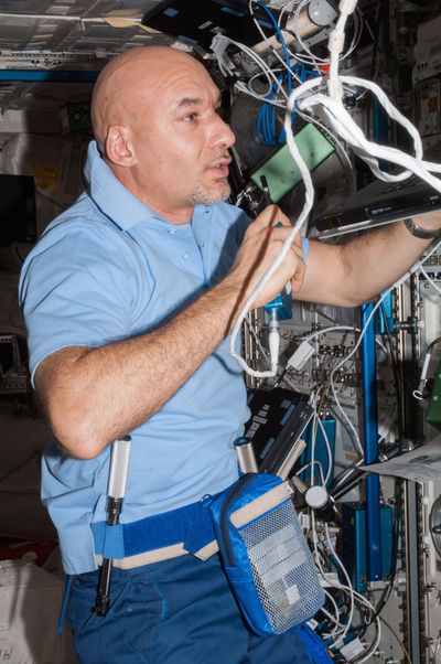 In this July 21 photo, European Space Agency astronaut Luca Parmitano speaks while working in the Columbus laboratory of the International Space Station. (Associated Press)