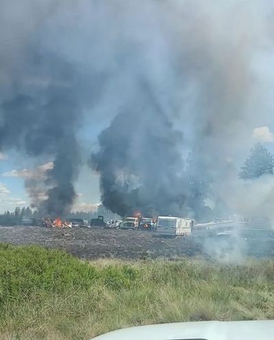 Firefighters on the West Plains battled a fire that destroyed 18 vehicles Wednesday on a rural parcel.  (Spokane County Fire District 10)