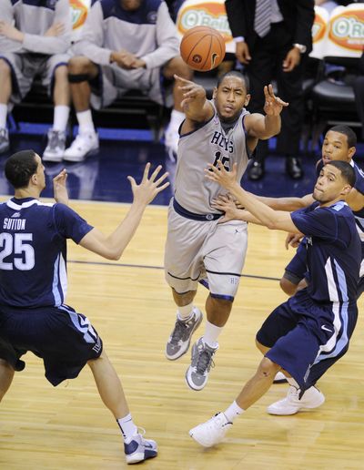 Georgetown’s Austin Freeman, center, had 25 points in the win. (Associated Press)