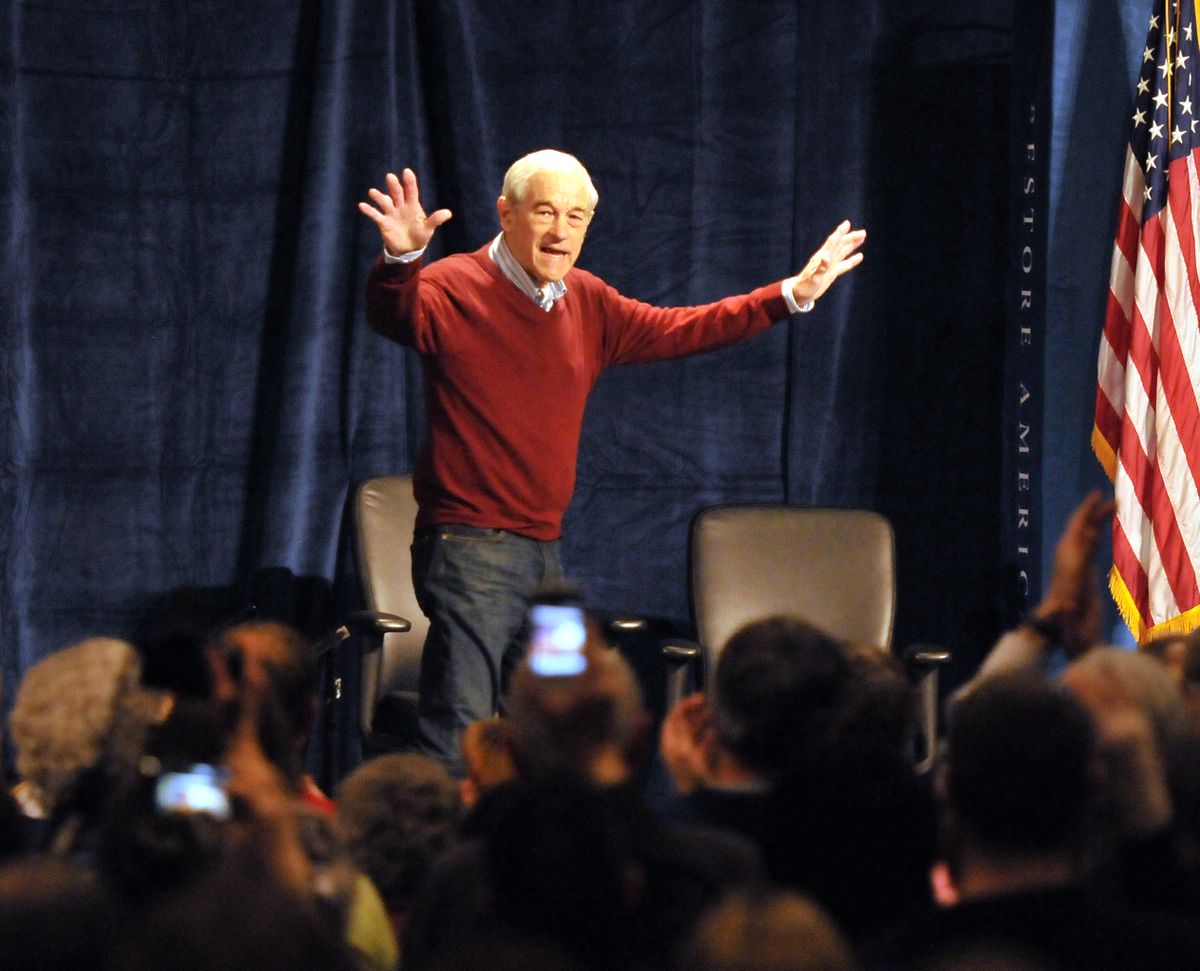 Republican presidential candidate Ron Paul walks on stage to thunderous applause Friday at the Spokane Convention Center, where about 2,300 people gathered for an hourlong rally. (Jesse Tinsley)