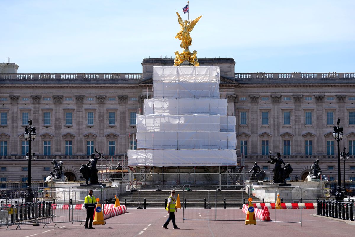 Building work in preparation for the Platinum Jubilee celebrations take place in front of Buckingham Palace in London, Friday, May 6, 2022. Britain