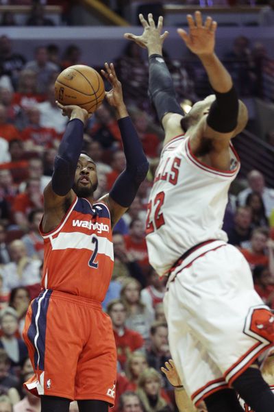 Wizards guard John Wall scored 16 points in his playoff debut. (Associated Press)