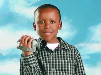 
Joshua Bynum, 8, with his video camera on the set of 