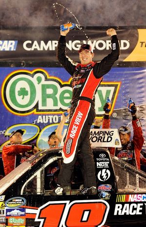Kyle Busch, driver of the No. 18 NASCAR.com Race View/Tundra Toyota, celebrates in Victory Lane after winning his third consecutive NASCAR Camping World Truck Series race at Bristol Motor Speedway on Wednesday in Bristol, Tenn. (Photo courtesy of John Harrelson/Getty Images for NASCAR) (John Harrelson / Getty Images North America)