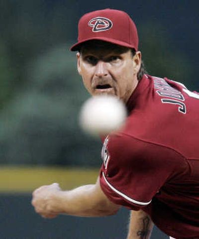 
Randy Johnson says his young team has learned what it takes to compete. (Associated Press / The Spokesman-Review)