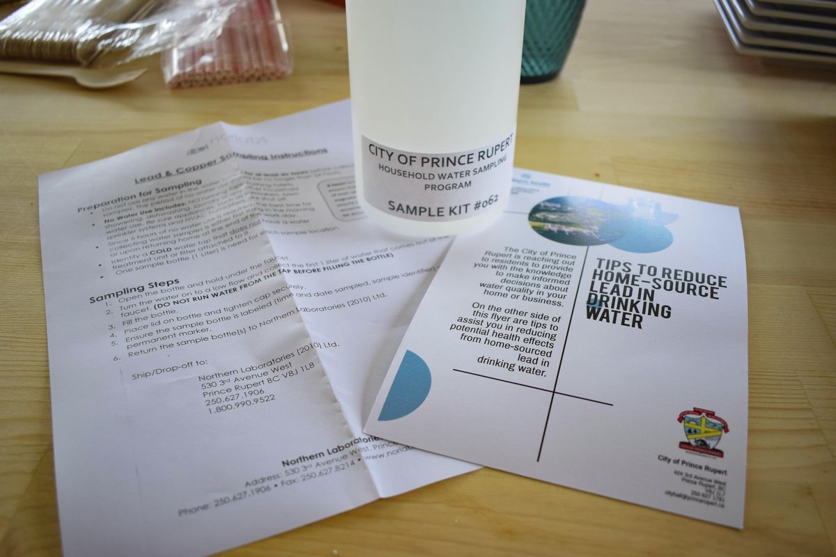 This July 19, 2019 photo shows a free drinking water sample kit from the regional healthcare provider Northern Health, received by Jessical Alexcee in Prince Rupert, British Columbia, Canada. However she, and other concerned residents participating in the sampling program will have to pay a fee to have the kit processed by the lab. (Mackenzie Lad / AP)