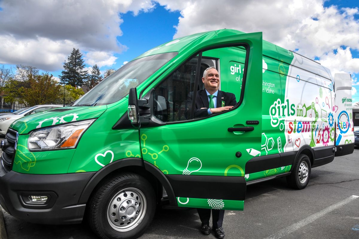 Brian Newberry, CEO of the Girl Scouts of Eastern Washington and Northern Idaho, shows off a new Ford Transit STEM mobile unit that will be making the rounds throughout the region.  (DAN PELLE/THE SPOKESMAN-REVIEW)