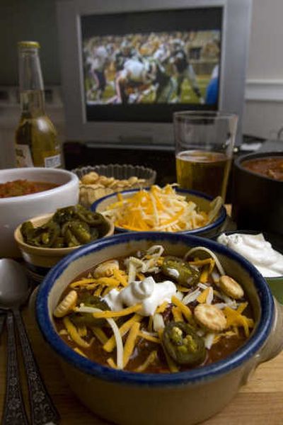 
Let your Super Bowl party guests tailor their preferences for chili with a chili bar. Associated Press
 (Associated Press / The Spokesman-Review)
