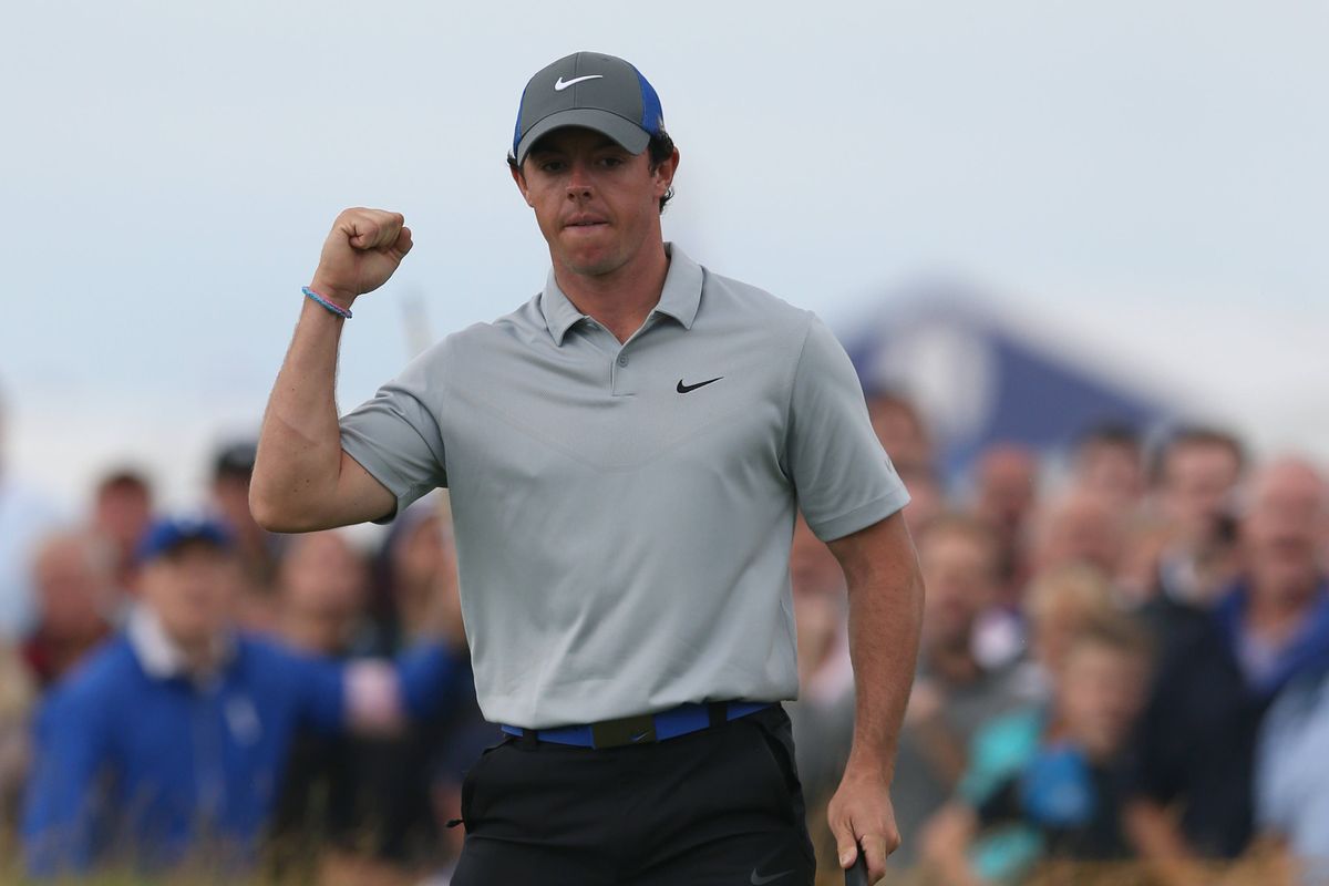 Rory McIlroy enjoys sinking an eagle putt on the 16th hole on Saturday at Royal Liverpool. (Associated Press)